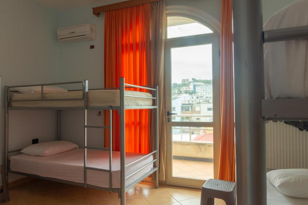 Postel nebo postele na pokoji v ubytování Luckyshine hostel