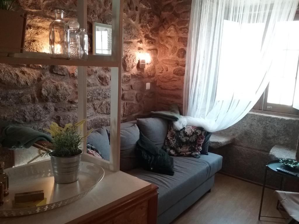 Uma área de estar em Casa do Forno