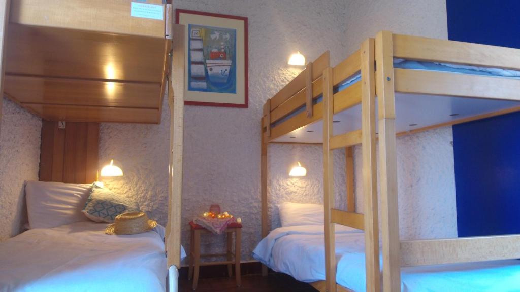Postel nebo postele na pokoji v ubytování VVF Belle-Île-en-Mer