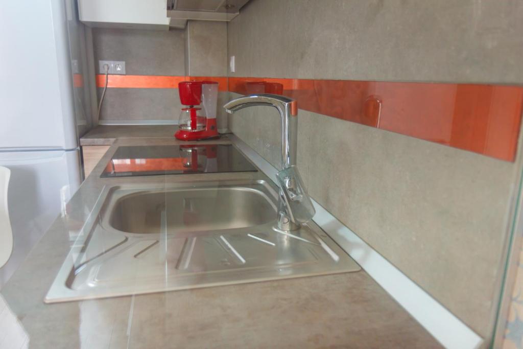 Kuchyň nebo kuchyňský kout v ubytování Gold Class Apartments AMS