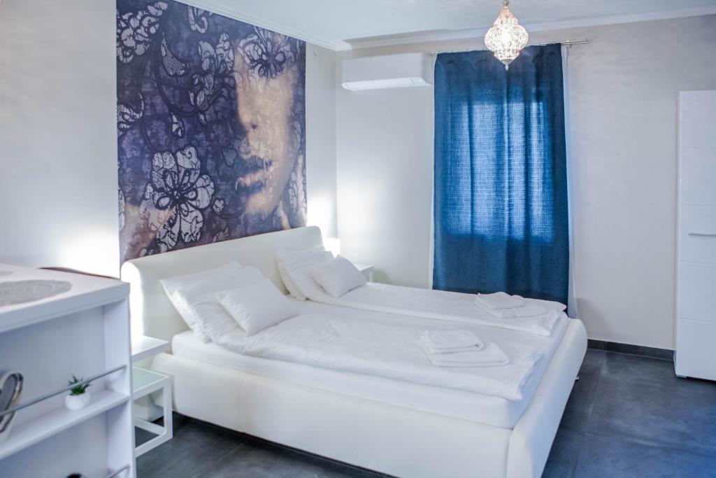Krevet ili kreveti u jedinici u okviru objekta Jázmin Apartman