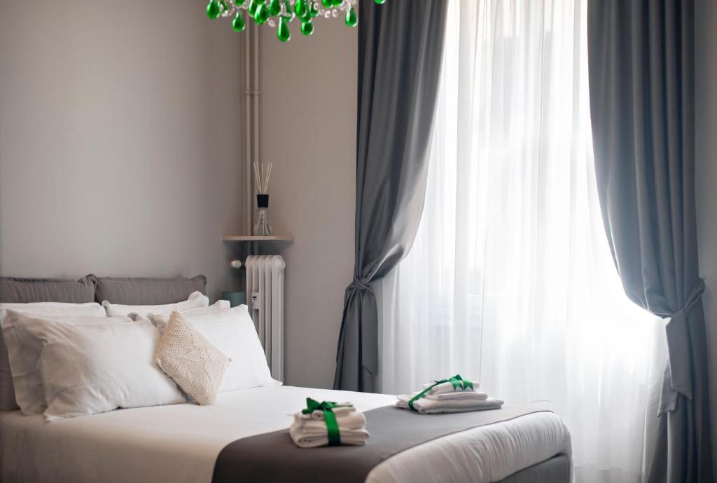 Ein Bett oder Betten in einem Zimmer der Unterkunft Il Genovino