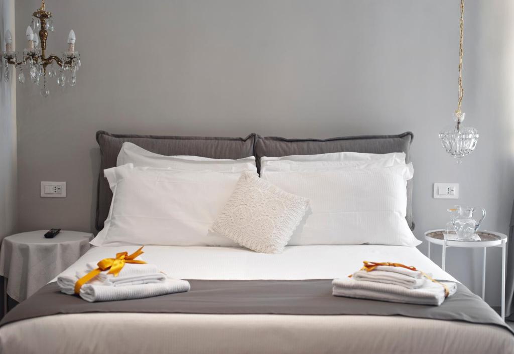 Ein Bett oder Betten in einem Zimmer der Unterkunft Il Genovino