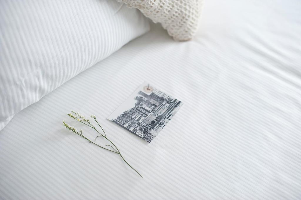 Ein Bett oder Betten in einem Zimmer der Unterkunft Il Genovino