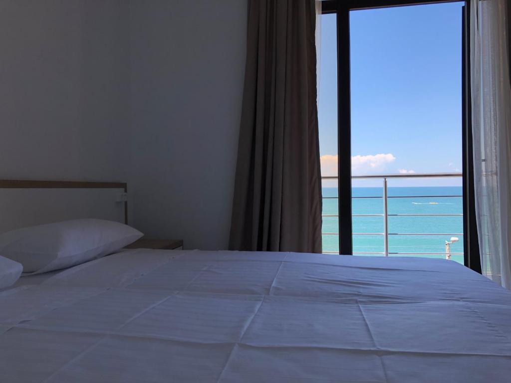 Postel nebo postele na pokoji v ubytování M-Rooms