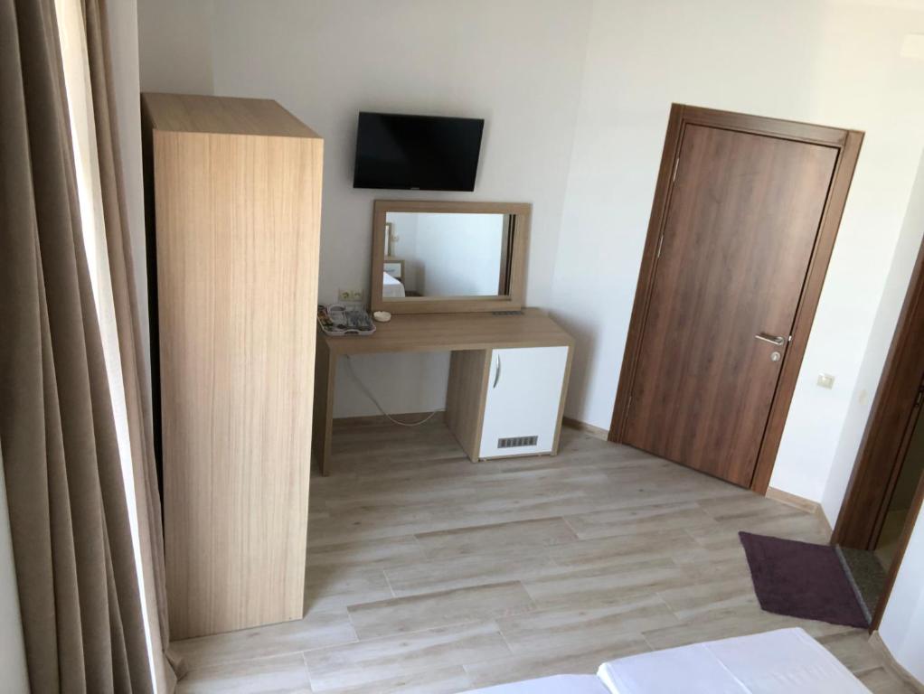 TV a/nebo společenská místnost v ubytování M-Rooms