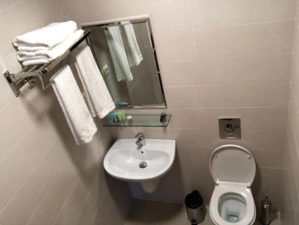 Koupelna v ubytování M-Rooms