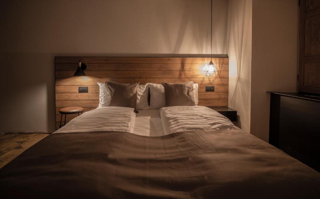 Postel nebo postele na pokoji v ubytování Casa Pasini-Foresteria