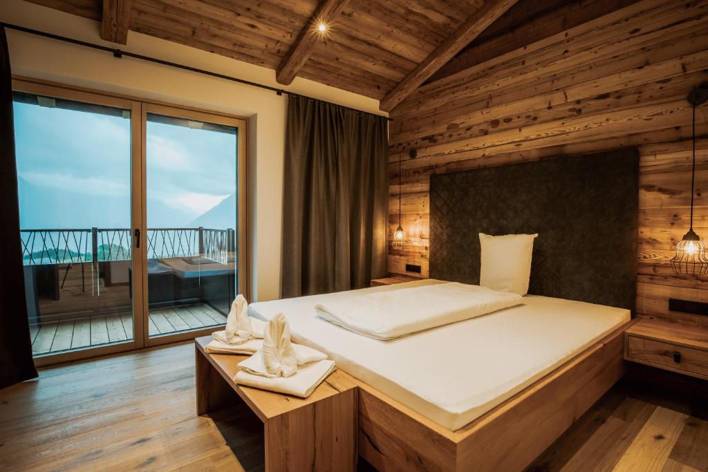 Postel nebo postele na pokoji v ubytování Rufana Alpin