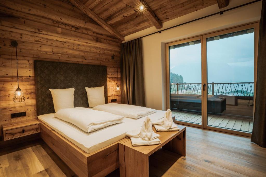 Postel nebo postele na pokoji v ubytování Rufana Alpin