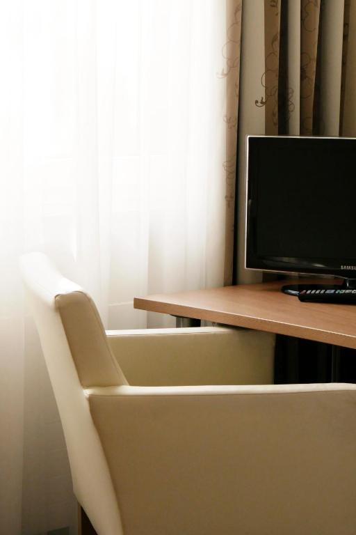 TV a/nebo společenská místnost v ubytování Hotel Rieth