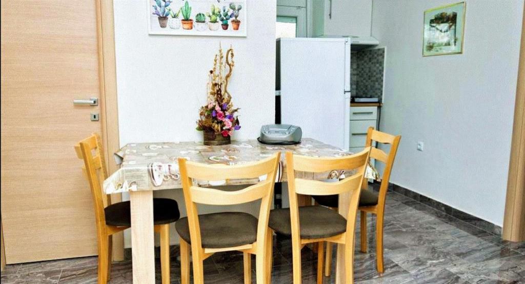 Kuchyň nebo kuchyňský kout v ubytování Cristi Apartments