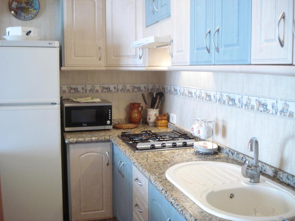 Kuchnia lub aneks kuchenny w obiekcie Apartamento Nicole Los Gigantes by Apartamentos Estrella del Norte
