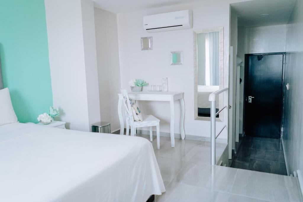Postel nebo postele na pokoji v ubytování Hotel Venedik