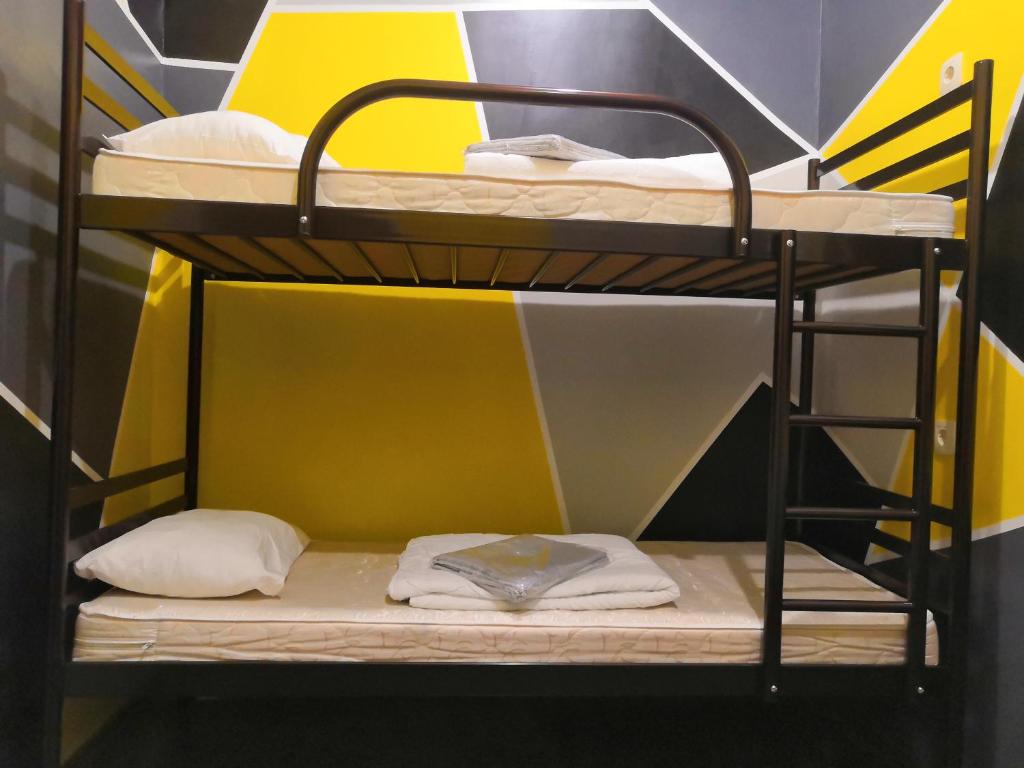 Postel nebo postele na pokoji v ubytování Yourhostel Университет