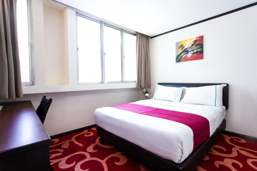 Postel nebo postele na pokoji v ubytování Hotel Vistaria