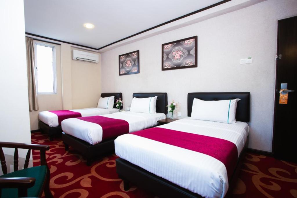 Postel nebo postele na pokoji v ubytování Hotel Vistaria