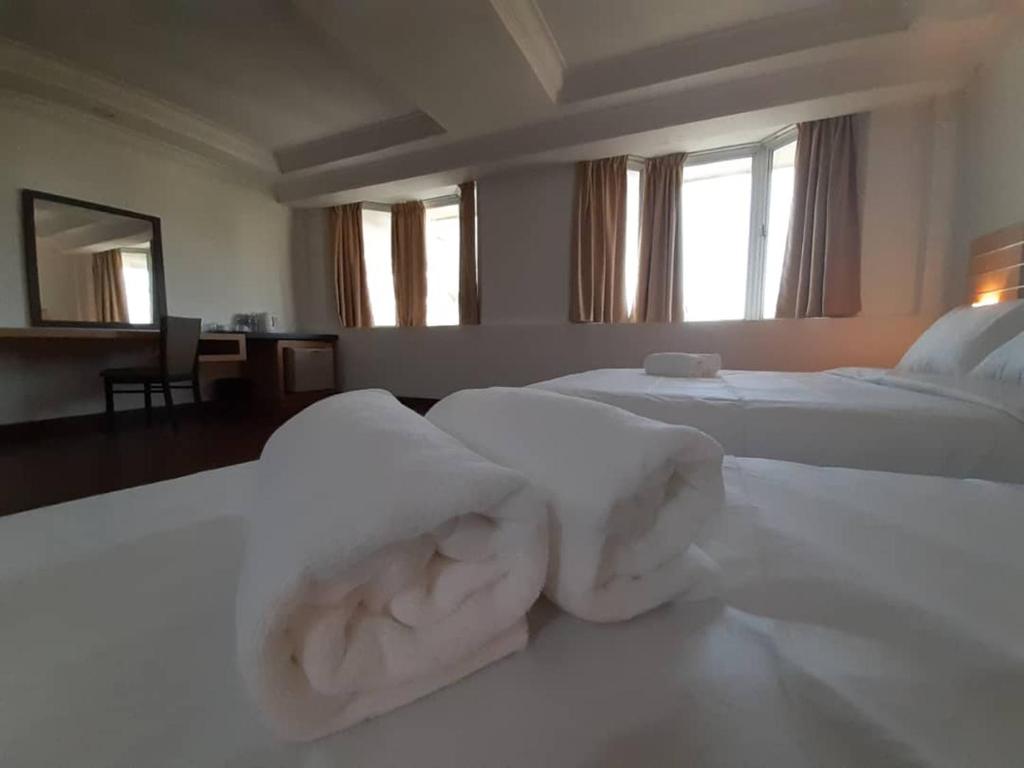 Postel nebo postele na pokoji v ubytování Sara Hotel