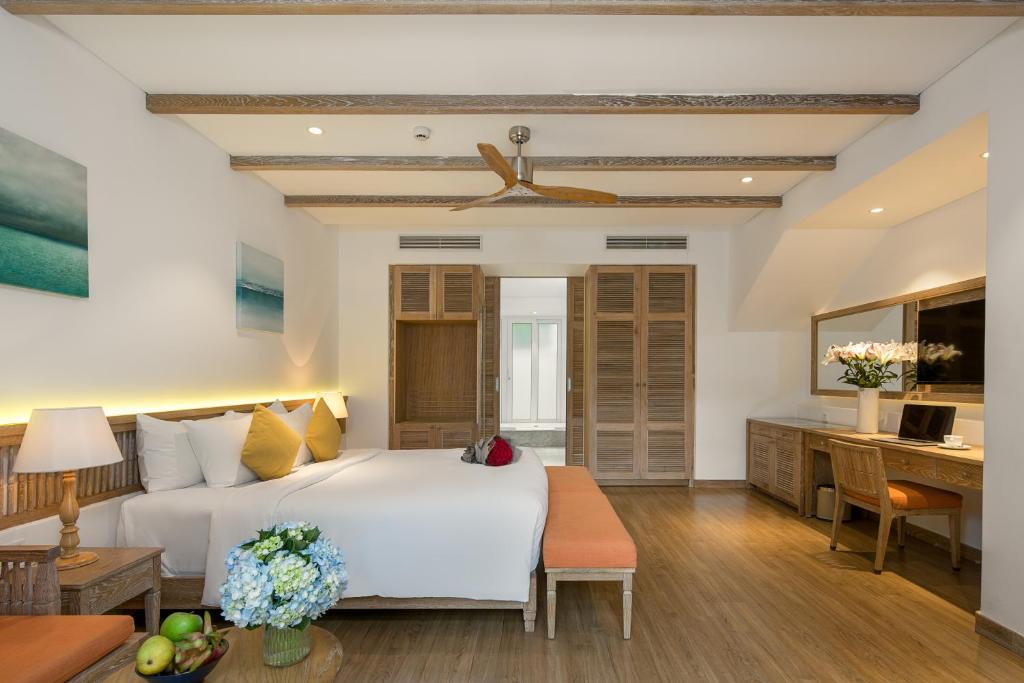 Letto o letti in una camera di Risemount Premier Resort Da Nang