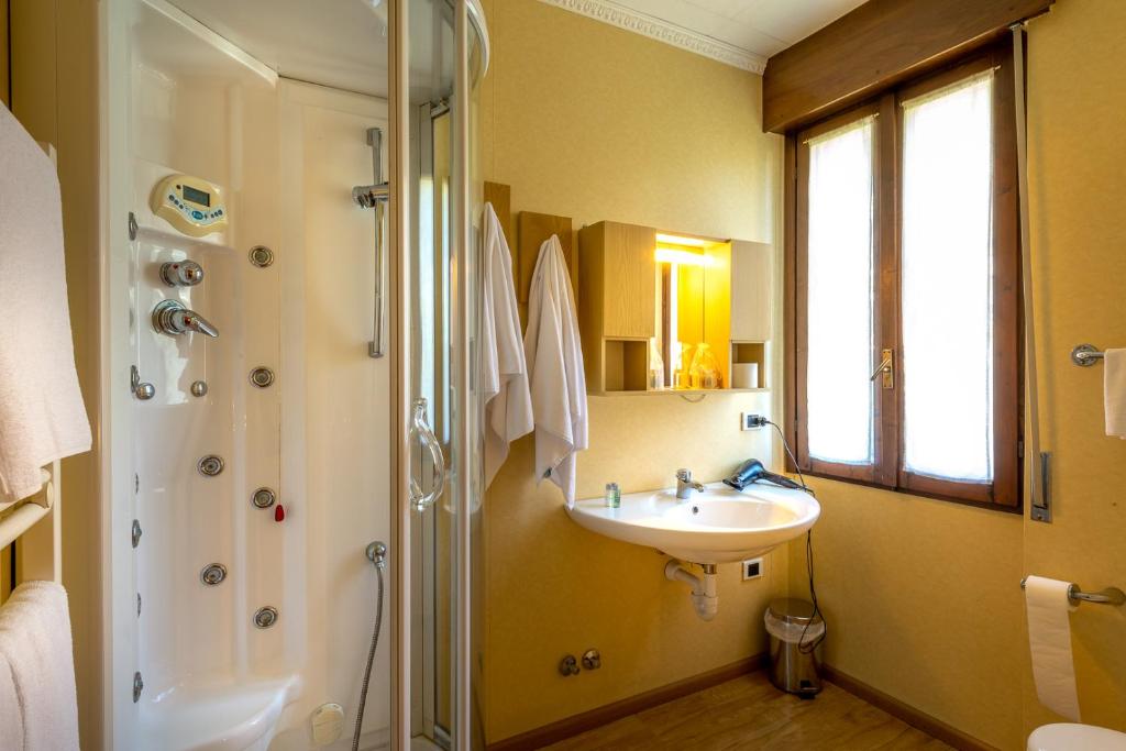 Koupelna v ubytování Hotel Club Funivia