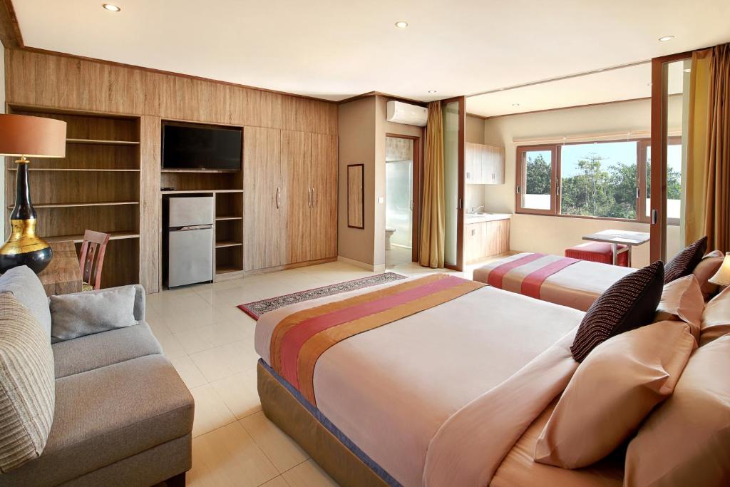 Postel nebo postele na pokoji v ubytování Puri Sabina Bed & Breakfast