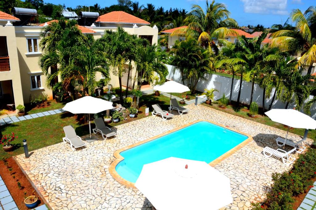 Bazén v ubytování La Pointe Villas nebo v jeho okolí