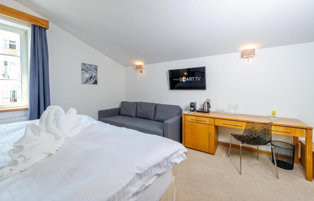 Telewizja i/lub zestaw kina domowego w obiekcie THE ROOMS