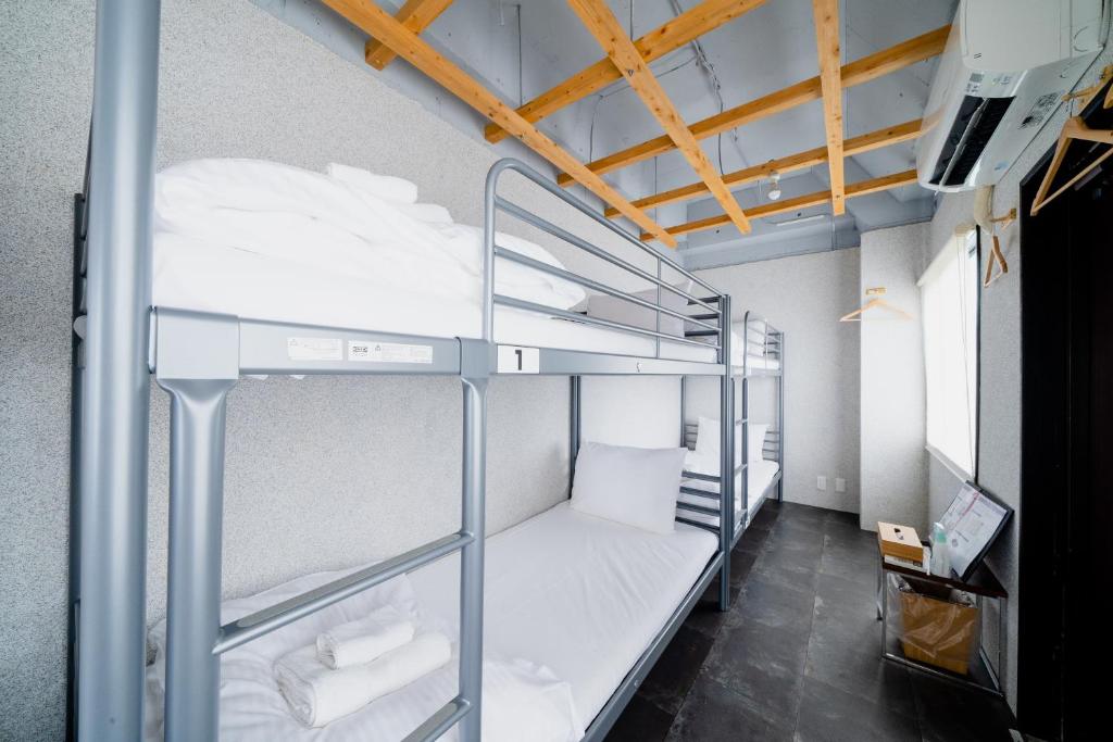 Postel nebo postele na pokoji v ubytování Hotel Pagoda