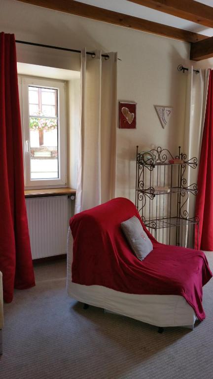 Postel nebo postele na pokoji v ubytování Chambres touristiques La Cour Des Hôtes