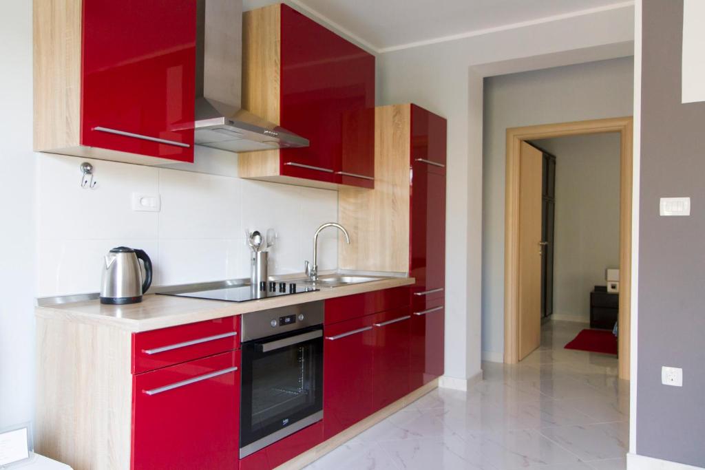 Kuchyňa alebo kuchynka v ubytovaní Modrika Apartments