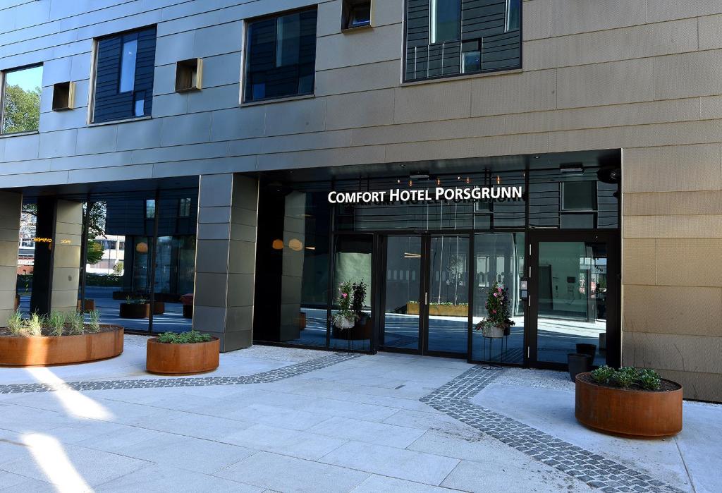 a building with a sign that reads convert hotel possession at Comfort Hotel Porsgrunn in Porsgrunn