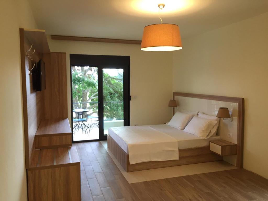 Postelja oz. postelje v sobi nastanitve Apartments E&S