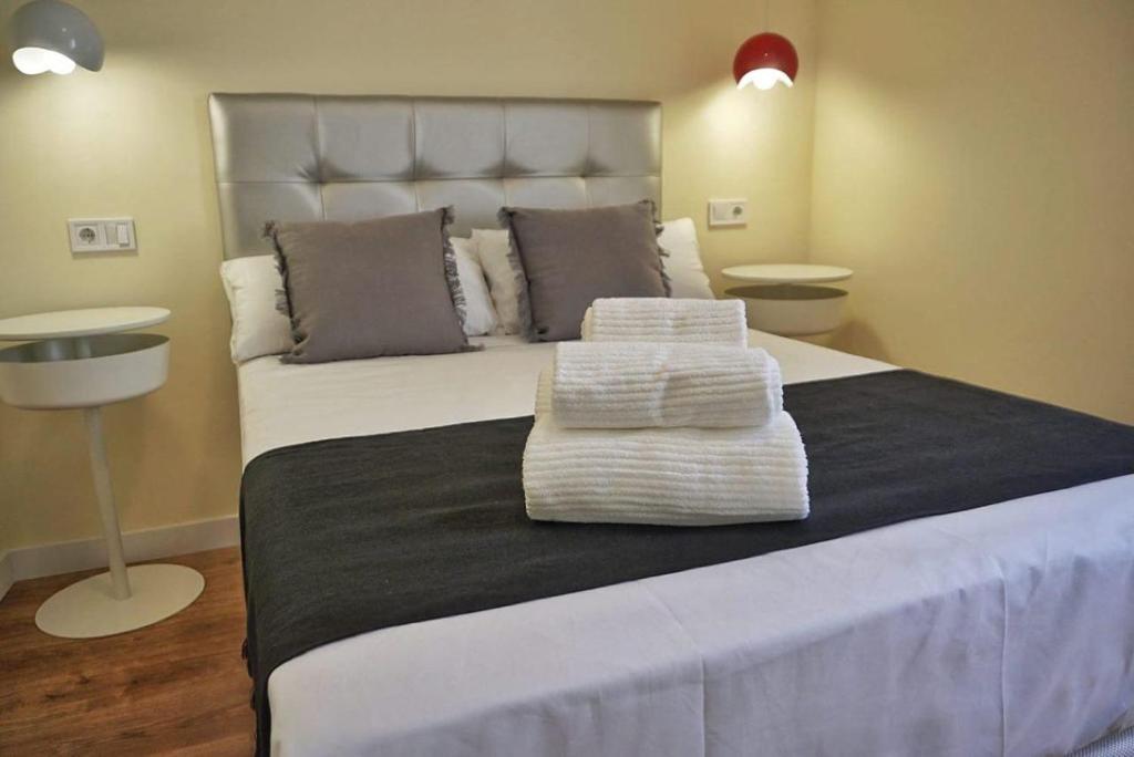 Postel nebo postele na pokoji v ubytování Good Stay Rooms