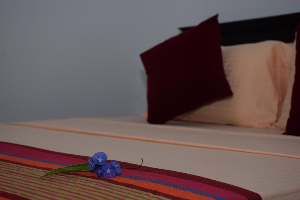 Postel nebo postele na pokoji v ubytování Gold inn