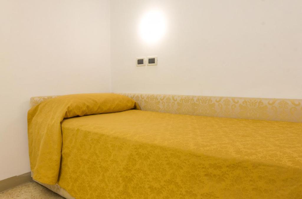 Postel nebo postele na pokoji v ubytování Hotel Adriatico