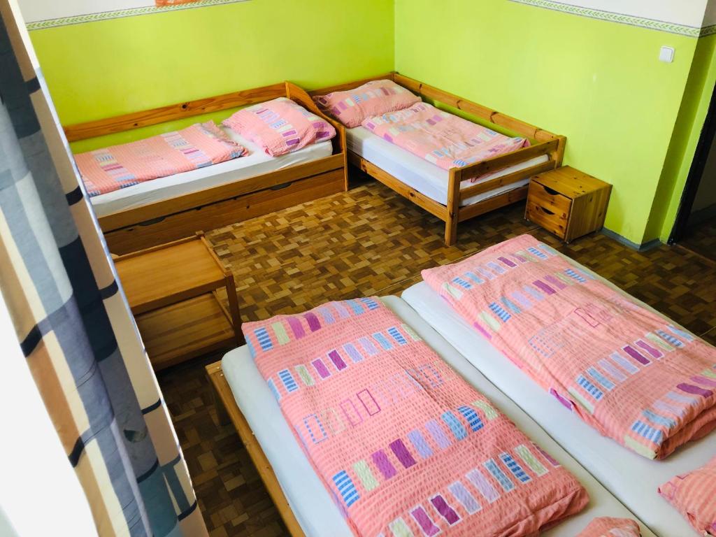 Postel nebo postele na pokoji v ubytování Penzion horská chata Světlá