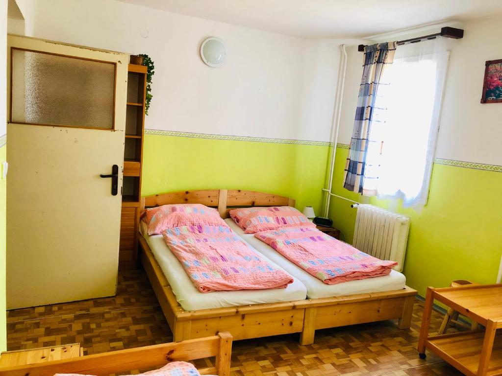 Postel nebo postele na pokoji v ubytování Penzion horská chata Světlá
