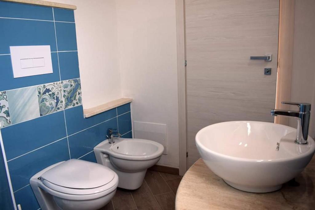 Koupelna v ubytování Corallo Rooms