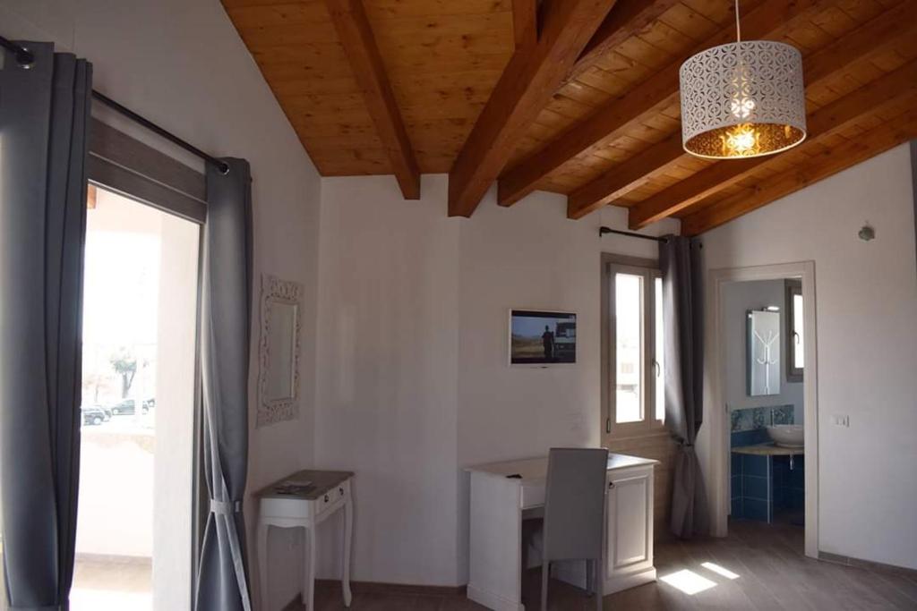 Kuchyň nebo kuchyňský kout v ubytování Corallo Rooms
