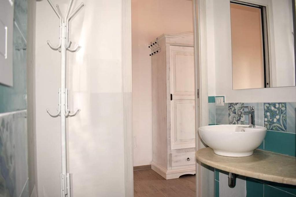 Koupelna v ubytování Corallo Rooms