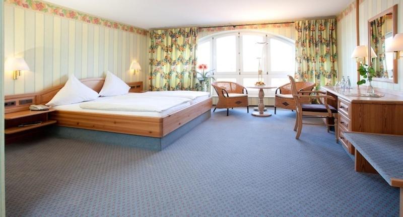 Postel nebo postele na pokoji v ubytování Hotel Altes Stadthaus
