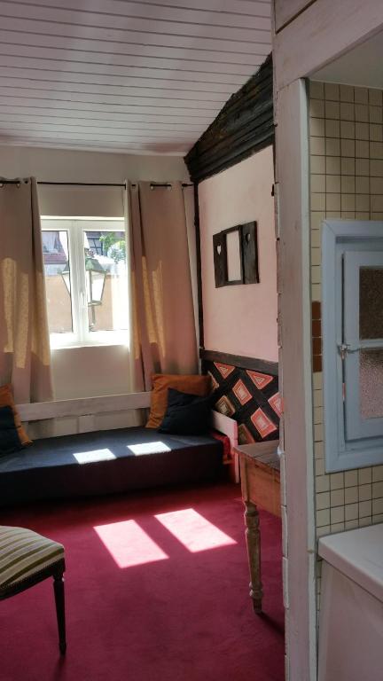 Posezení v ubytování Chambres touristiques La Cour Des Hôtes
