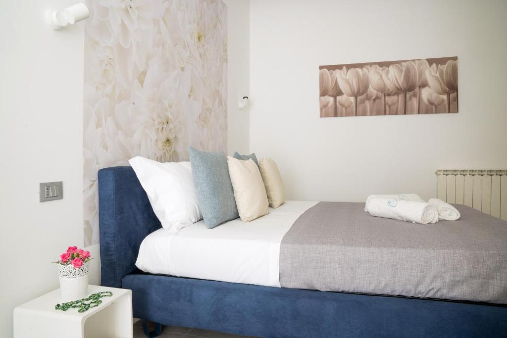 Postel nebo postele na pokoji v ubytování Dimora Chlóe B&B