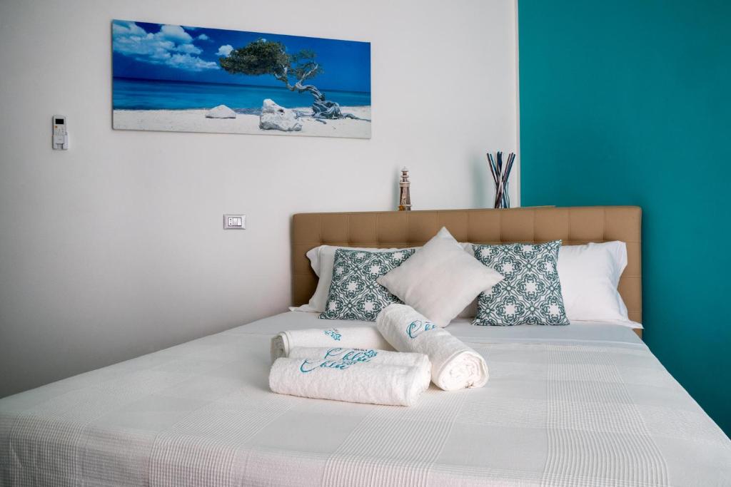Postel nebo postele na pokoji v ubytování Dimora Chlóe B&B