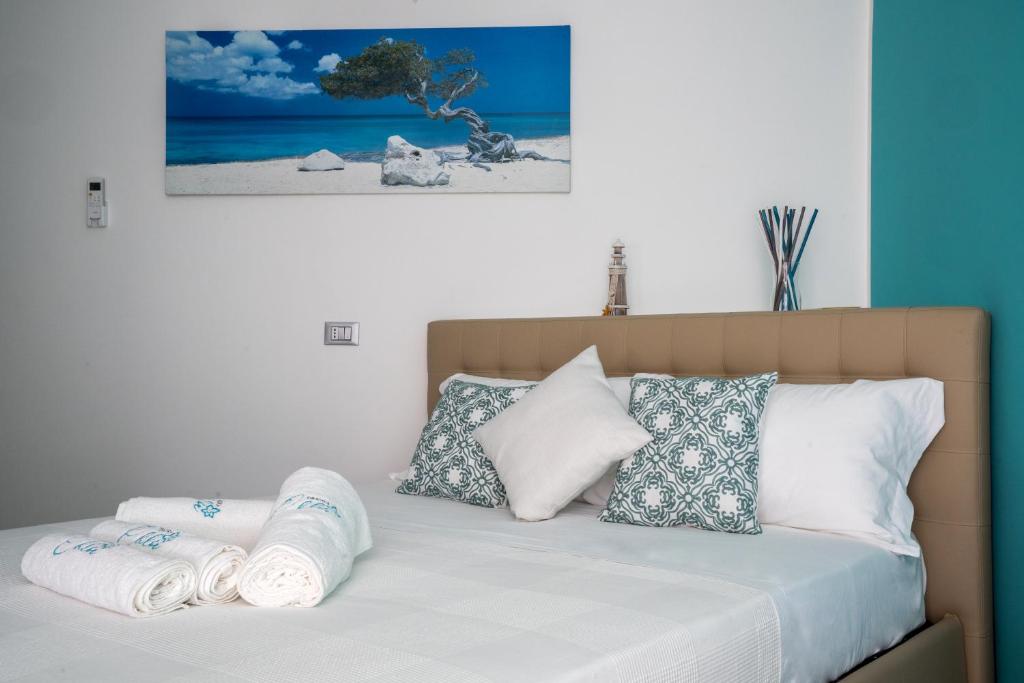 Postel nebo postele na pokoji v ubytování Dimora Chlóe B&B
