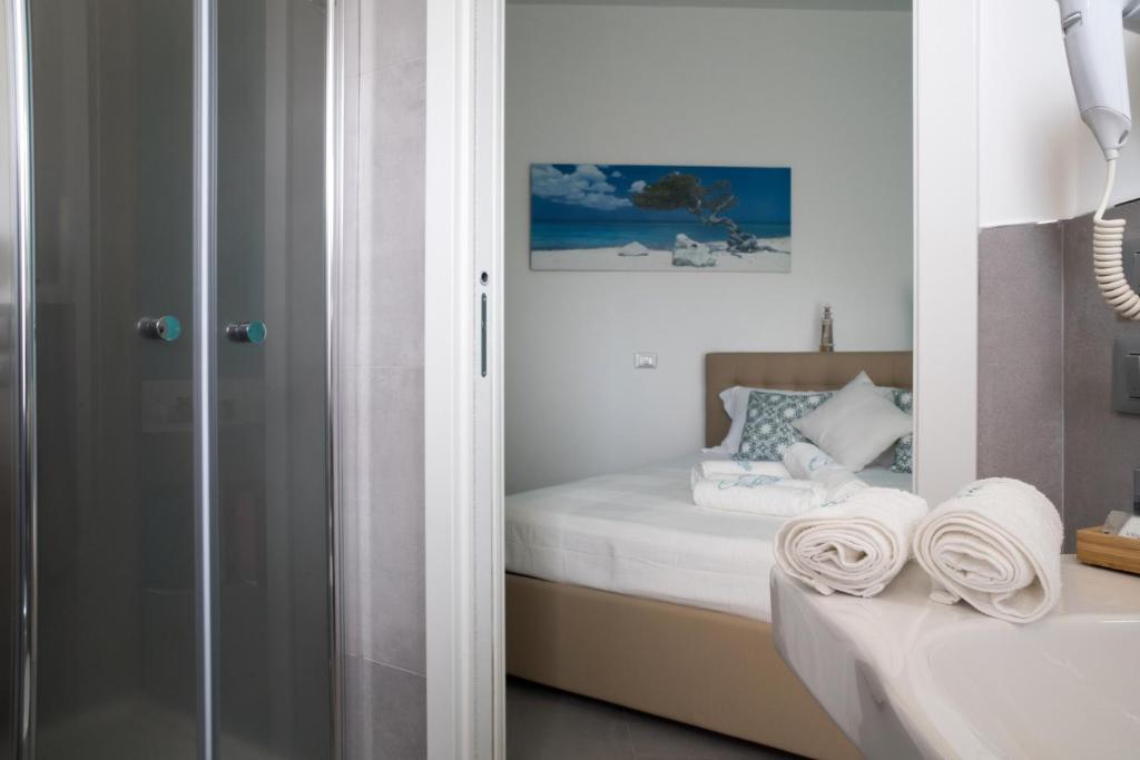 Postel nebo postele na pokoji v ubytování Dimora Chlóe B&B