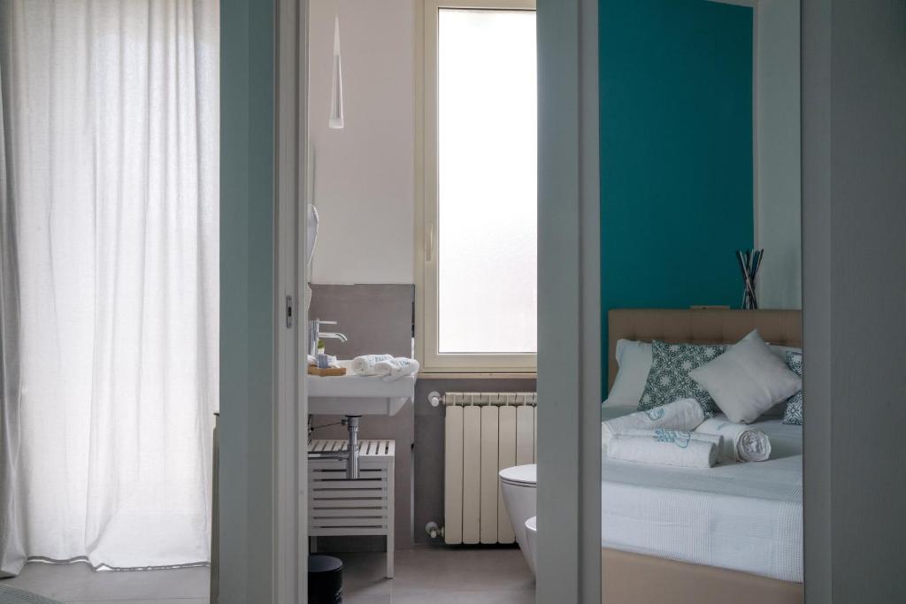 Postel nebo postele na pokoji v ubytování Dimora Chlóe B&B