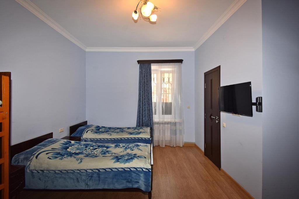 Postel nebo postele na pokoji v ubytování Guest House Arsan
