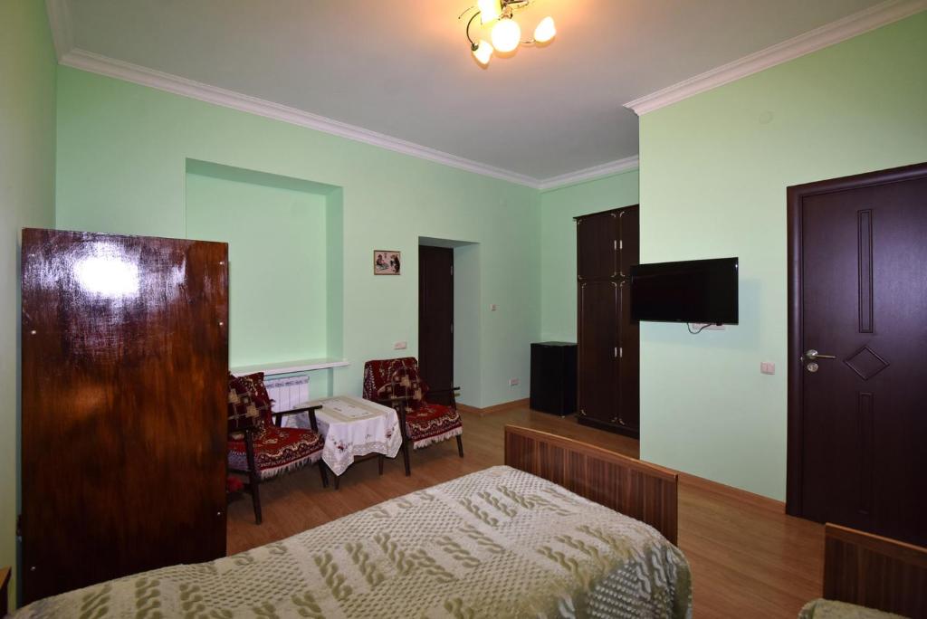 TV a/nebo společenská místnost v ubytování Guest House Arsan