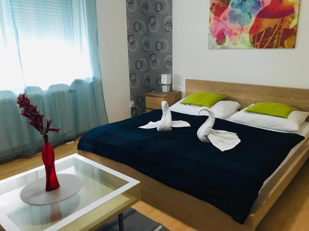 Postel nebo postele na pokoji v ubytování Hotel Orlan